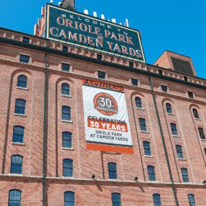 Image of a brick building with the words "Oriole Park Camden Yards"